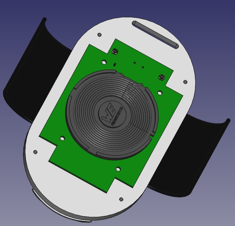 CAD render of the charger's internal coil and PCB assembly
